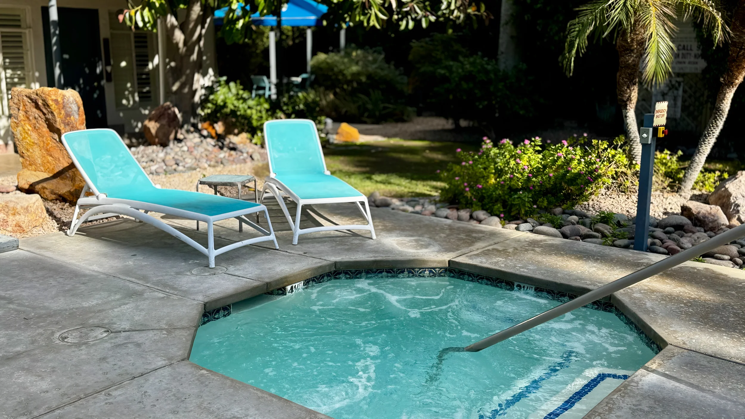 Updated hot tub and pool area at Desert Paradise Resort in Palm Springs